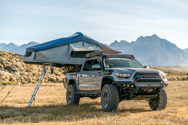 Vagabond Rooftop Tent in Slate Grey Navy Blue shown on Toyota Tacoma